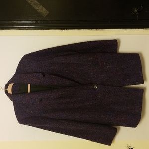 Knitted multicolored coat.